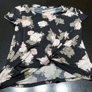 Candies size large blouse knotted in the front on the bottom 95% poly 5%…